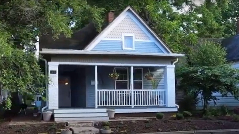 small blue colonial house