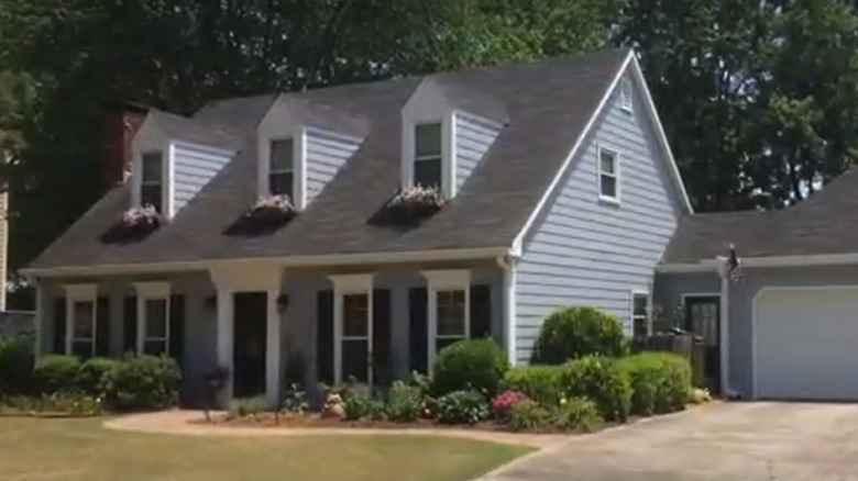 colonial house with flowers