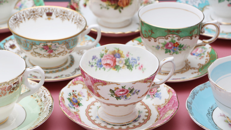 Close up of vintage china tea cups and plates
