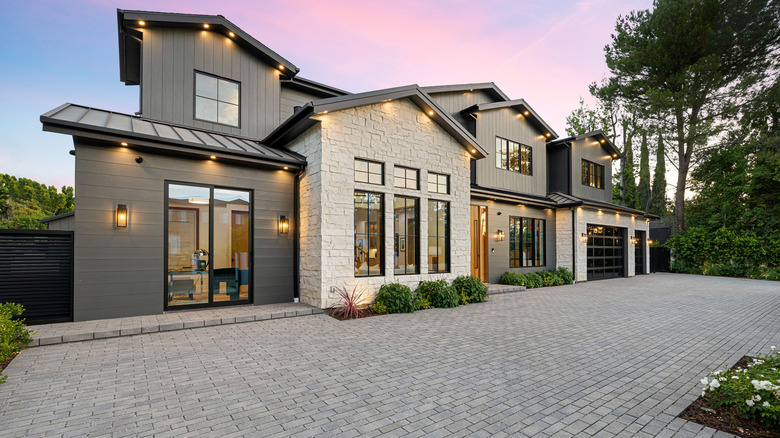 Modern luxury home with permeable paving driveway