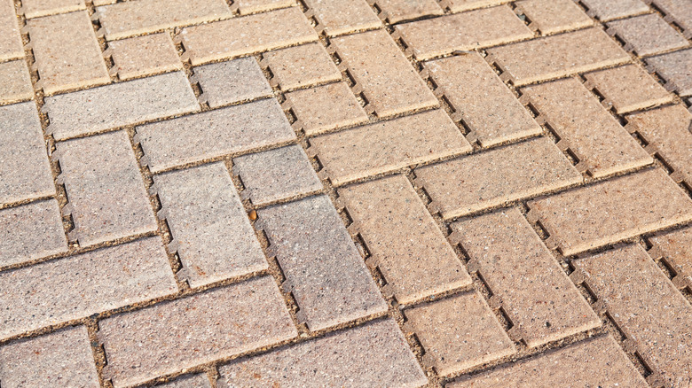 A close up of permeable paving driveway