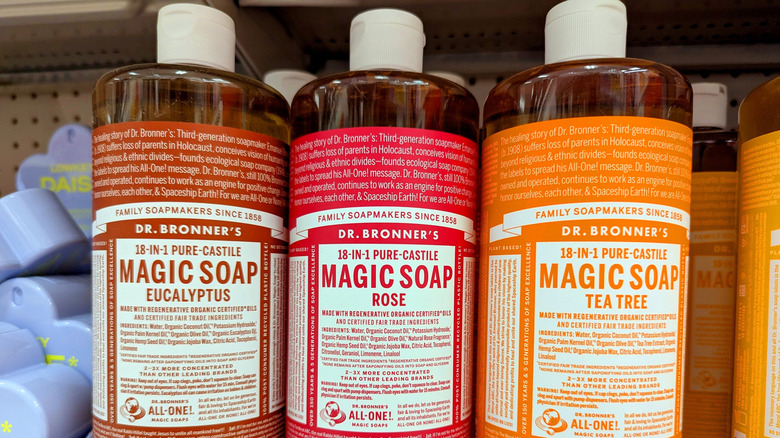 Close up of Dr. Bronner castile soap bottles on store shelf