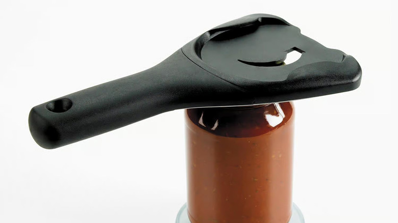 OXO's Good Grips Manual Jar Opener mounted on a glass jar