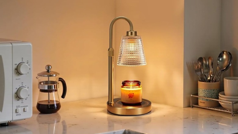A candle warmer sitting on a kitchen counter