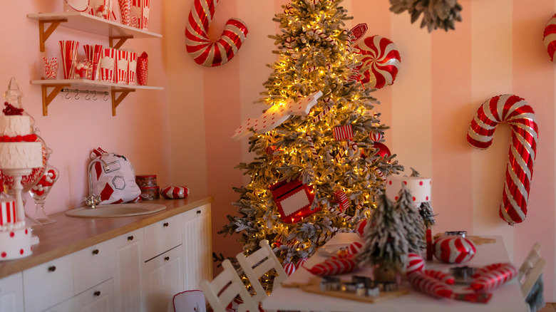 Candy cane theme décor in a small kitchen.