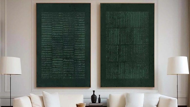 Hunter green wall art hanging on a wall