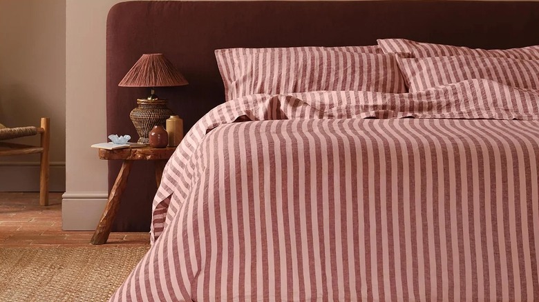 Muted burgundy striped bedding