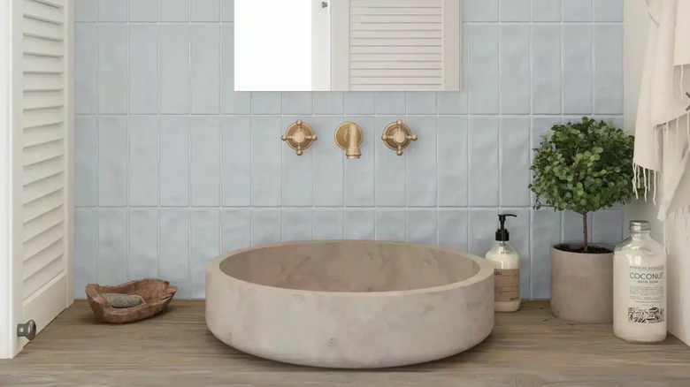 Powder blue backsplash tiles on a bathroom vanity