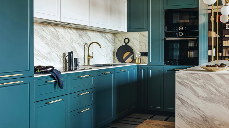 dark teal cabinetry in kitchen