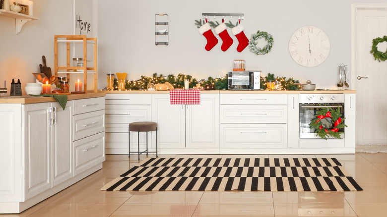 Christmas stockings hung in kitchen