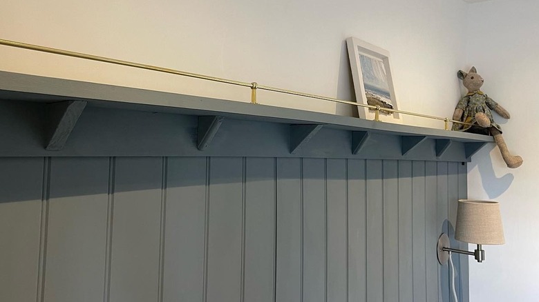 Gallery rail along a topper ledge for wainscoting