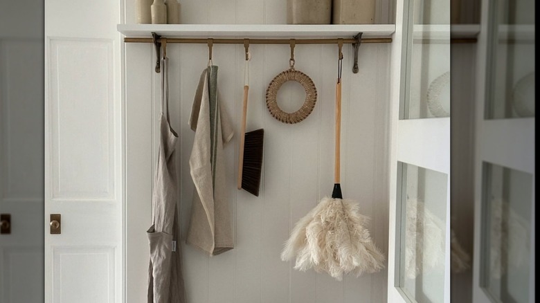 Gallery rail with cleaning supplies