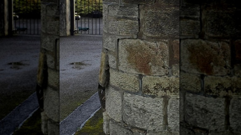 Stone wall with bulging stones