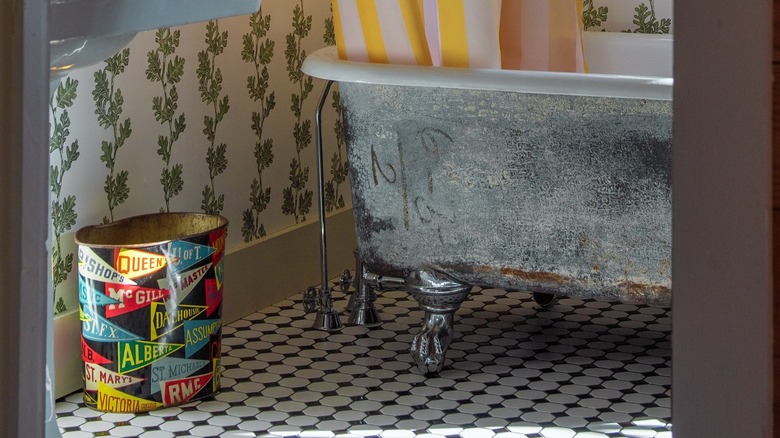 colorful tin bathroom trash can