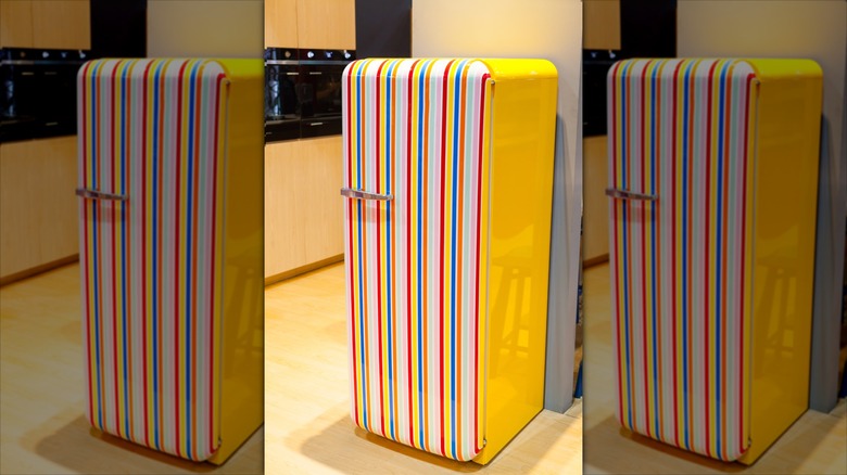 Retro-style fridge covered in a striped pattern