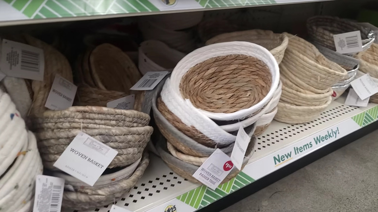 Stacks of woven baskets on a Dollar Tree shelf