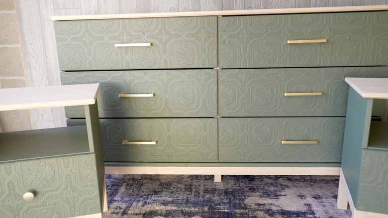IKEA furniture with green wallpaper