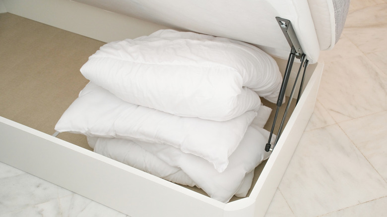 Duvet covers in a storage ottoman