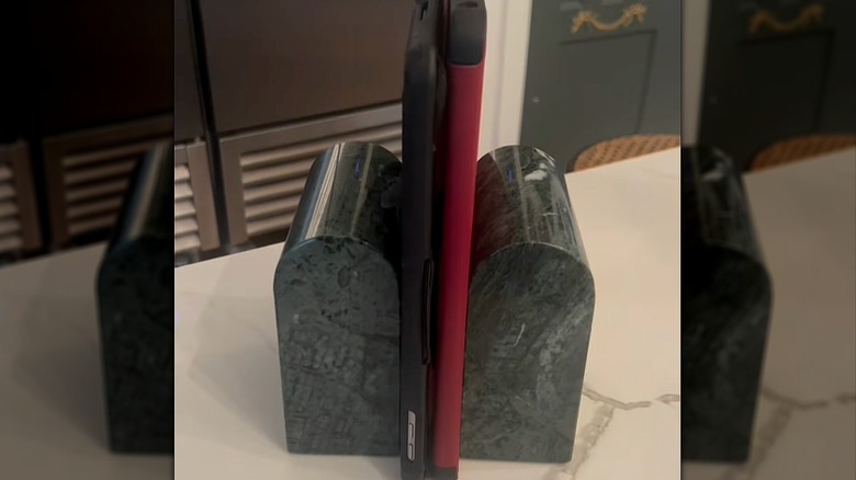 Bookends keeping tablets together