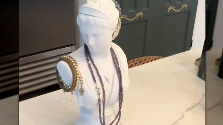 A single bookend used as a jewelry holder