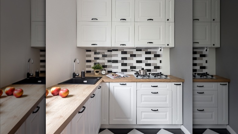 White kitchen with busy backsplash