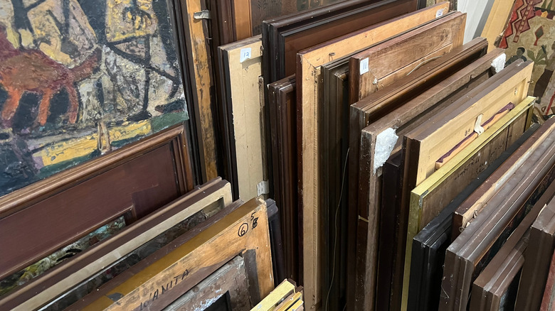 Stacks of framed artwork