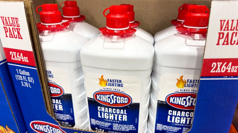 Cardboard case of lighter fluid bottles