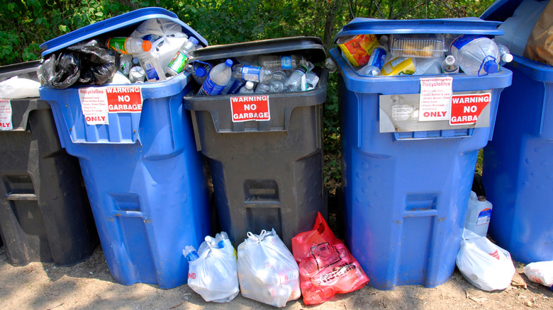 Overflowing trash cans