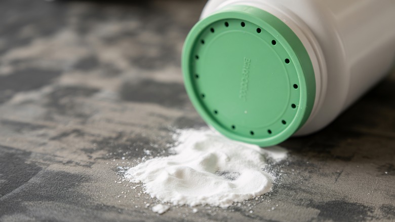 Closeup of baby powder spilled on table