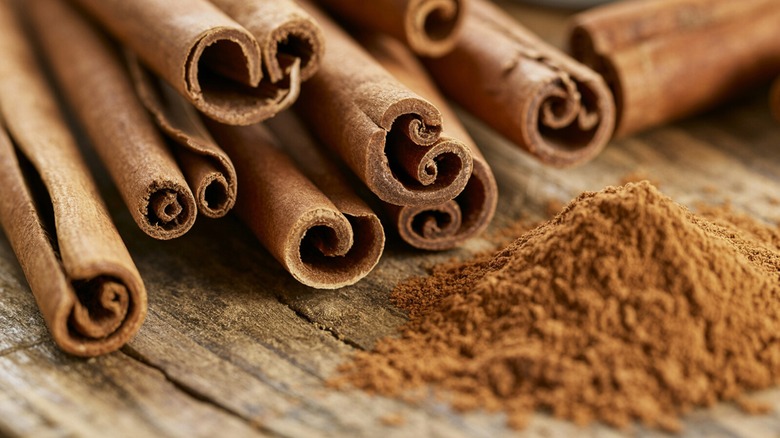 Closeup of cinnamon sticks and powder