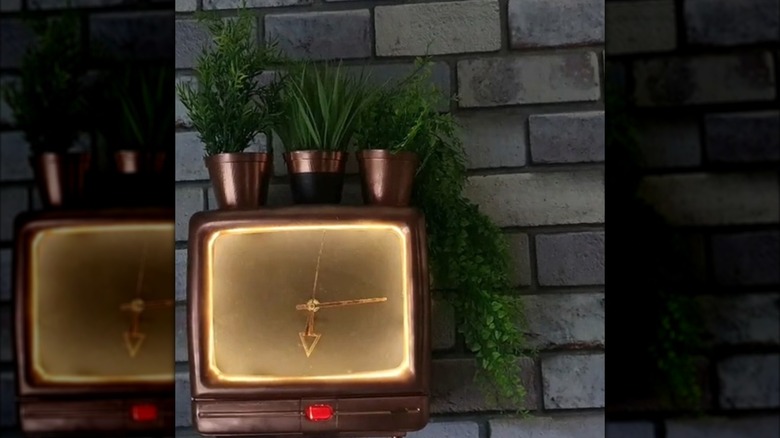 View of a painted tube TV turned into a clock without numbers