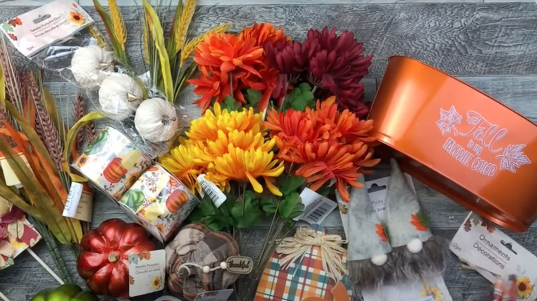 Assorted fall decor on gray table