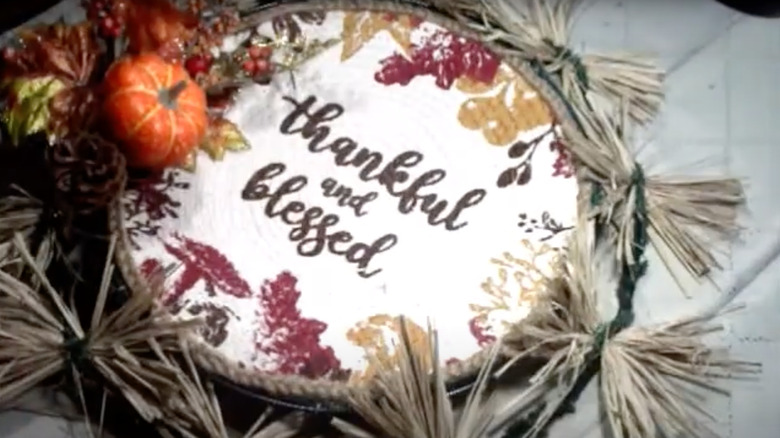 Fall wreath around "Thankful and blessed" cross-stitch