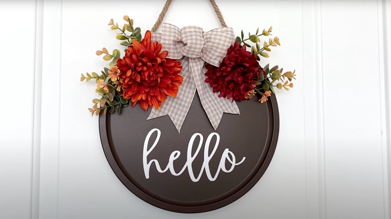"Hello" fall wreath made from pizza pan