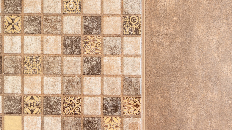 Closeup of small tiles next to big tiles