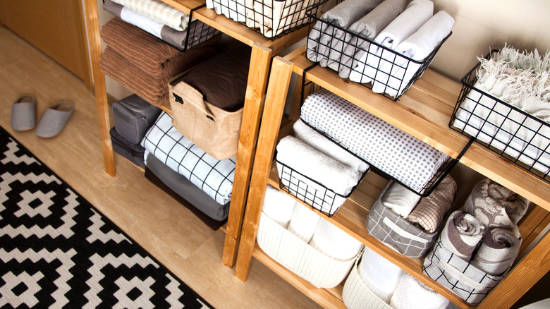 Clothes baskets on shelves