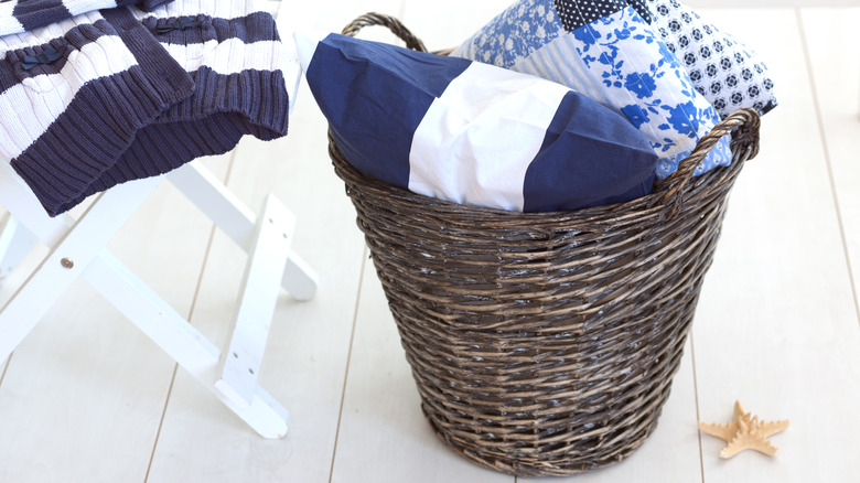 Pillow and blanket in the basket.