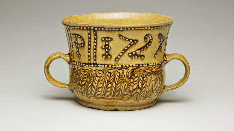 Vintage Staffordshire pottery from the 1700s with a slip coating