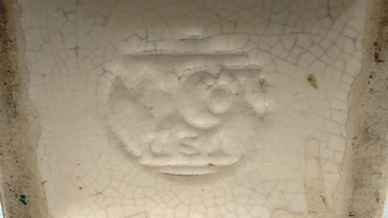 Maker's stamp on the bottom of a pot