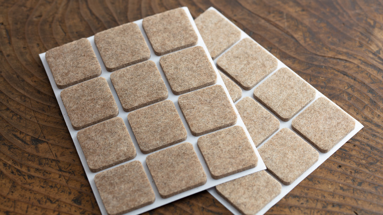 Anti-slip felt pads on a table