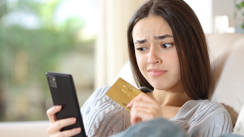 Suspicious woman thinking item is too good to be true