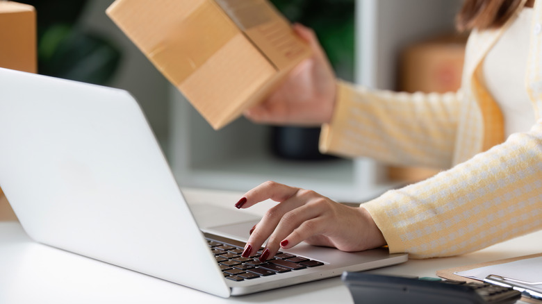 Women checking online how to return an item