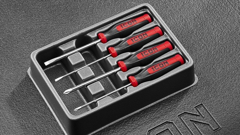 An Icon Professional Mini Screwdriver Set sits in an open tool storage drawer