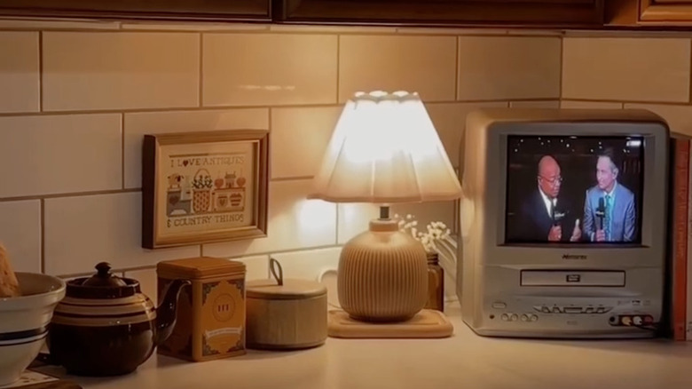A vintage tv on kitchen counter