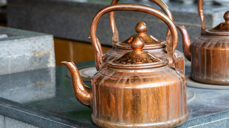 A vintage copper kettle