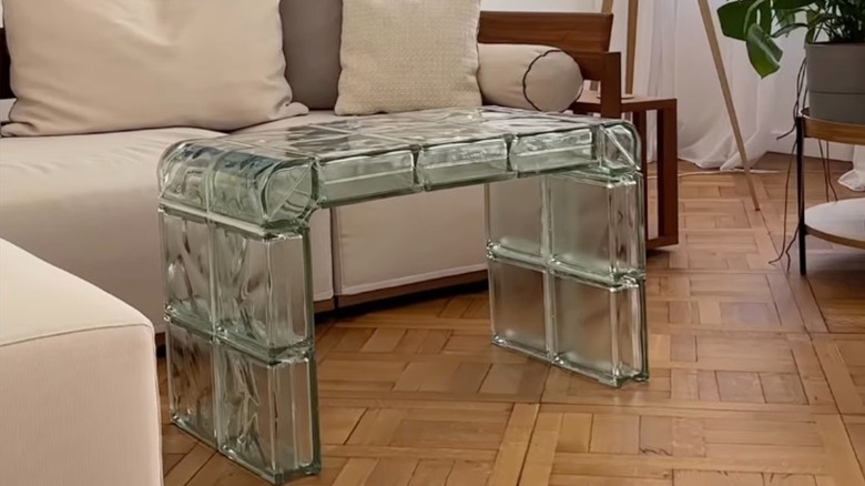 Homemade coffee table in living room made from glass blocks.
