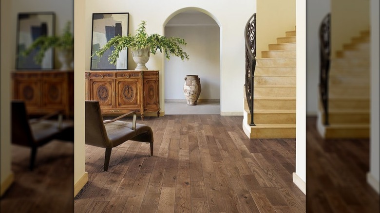 Brown hardwood floors in an entryway/living room
