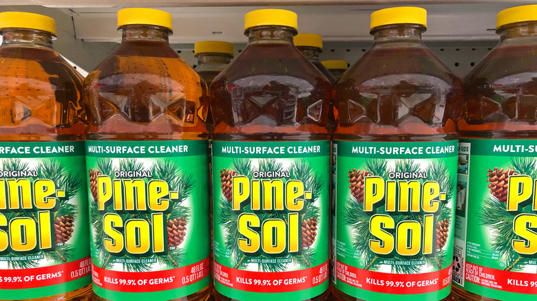 bottles of Pine Sol on shelf