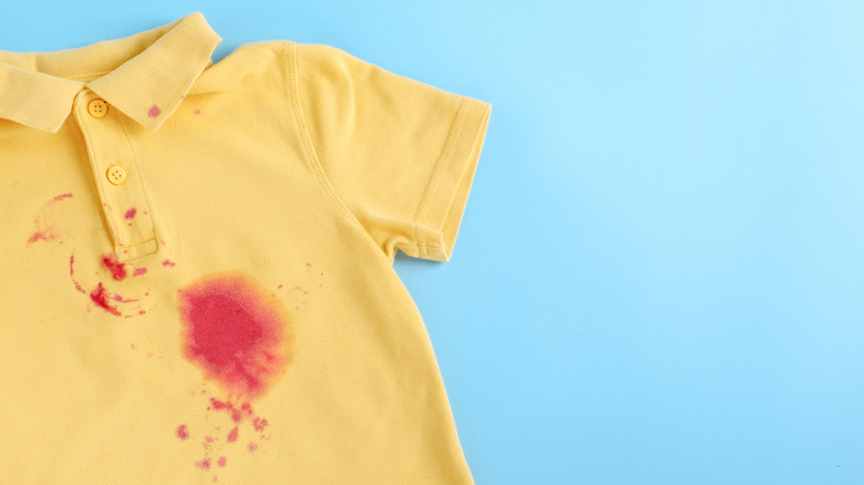 stained yellow shirt