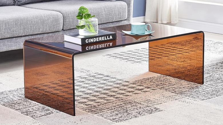 amber-colored glass coffee table